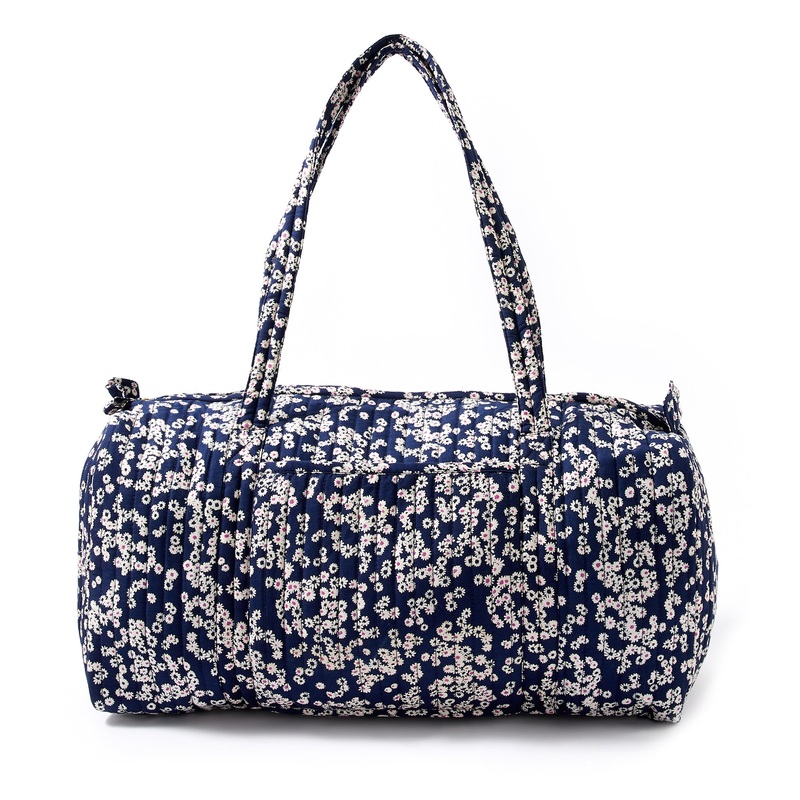 Accessorize London women's Blue Fabric Ditsy Daisy Weekender Travel bag